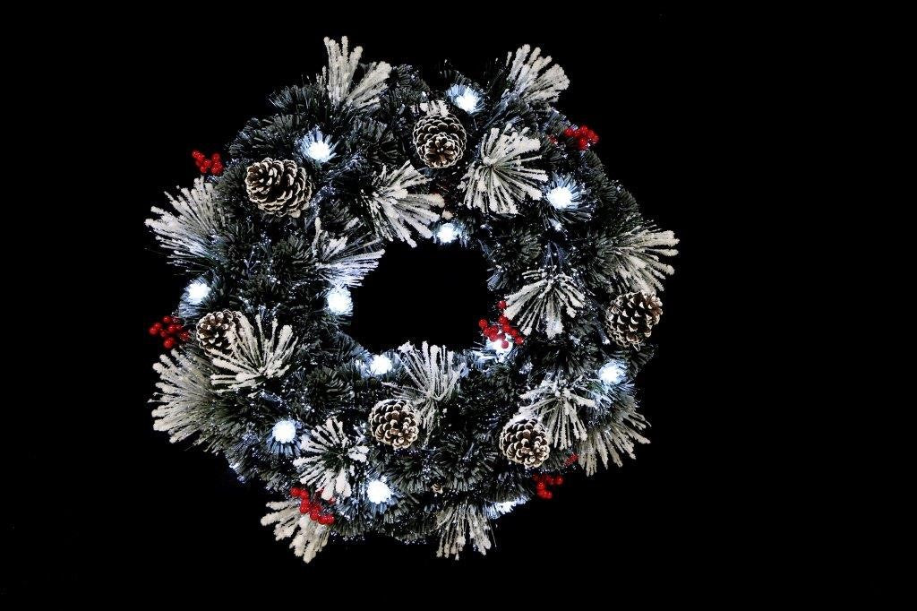 WREATH AND GARLAND FLOCKED WITH CONES AND BERRIES